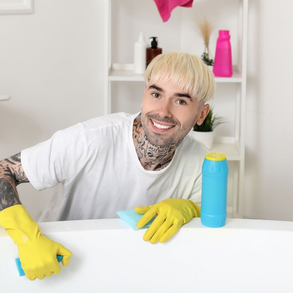 DIY home decoration and repair project with hardware tools including drill, paint brushes, and shelving materials