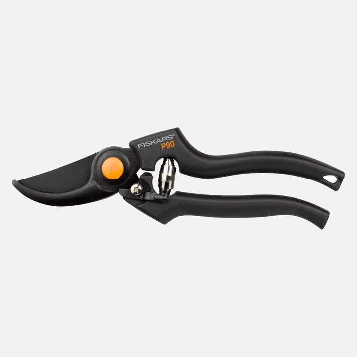 Bypass garden pruning shears with PTFE-coated steel blade and ergonomic handle for precise branch cutting.
